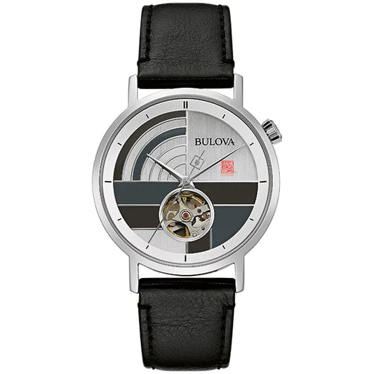 Bulova Frank Lloyd Wright 'December Gifts' Stainless Steel 3-Hand Automatic Watch featuring a silver-tone stainless steel case, black leather strap, and a gray patterned dial with silver accents and an open aperture showcasing the automatic movement. The watch also has a glass exhibition case back, revealing the intricate mechanics, and is water-resistant up to 30 meters.