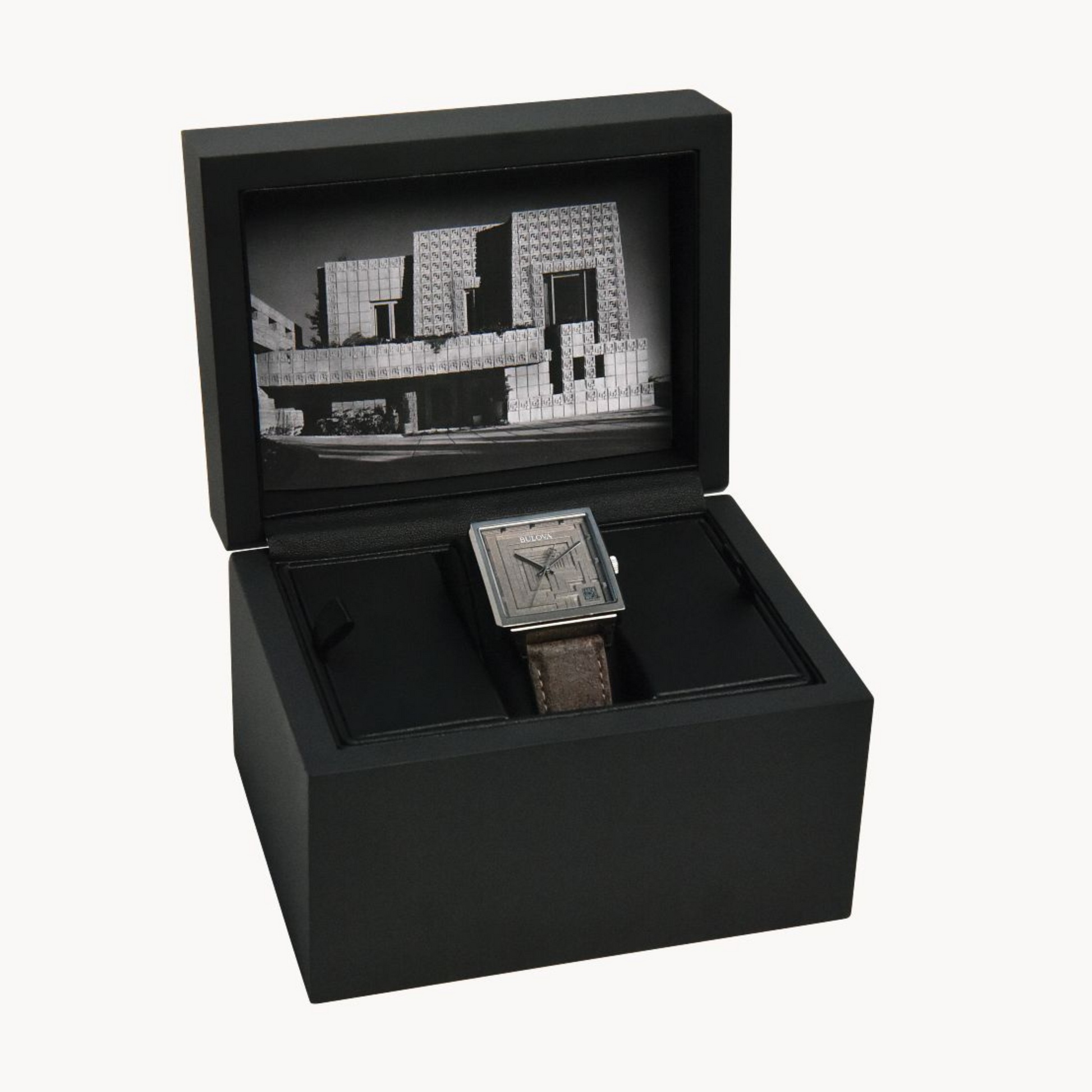 Bulova Frank Lloyd Wright Ennis House Men’s Watch featuring exclusive packaging and Frank Lloyd Wright Collection storybook.